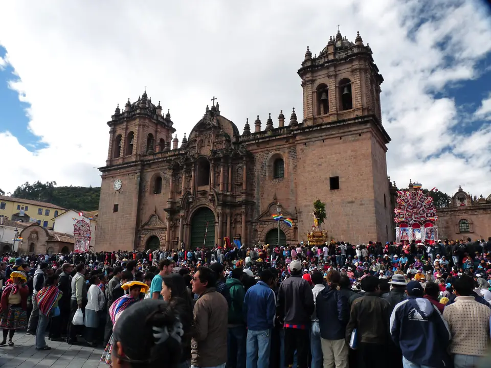 Crowds in the Plaza de Armas of Cusco before the cathedral during Corpus Christi