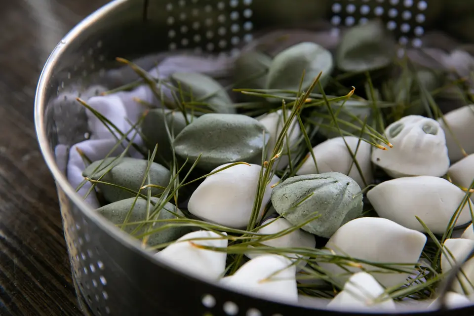 Songpyeon steamed on a layer of pine needles